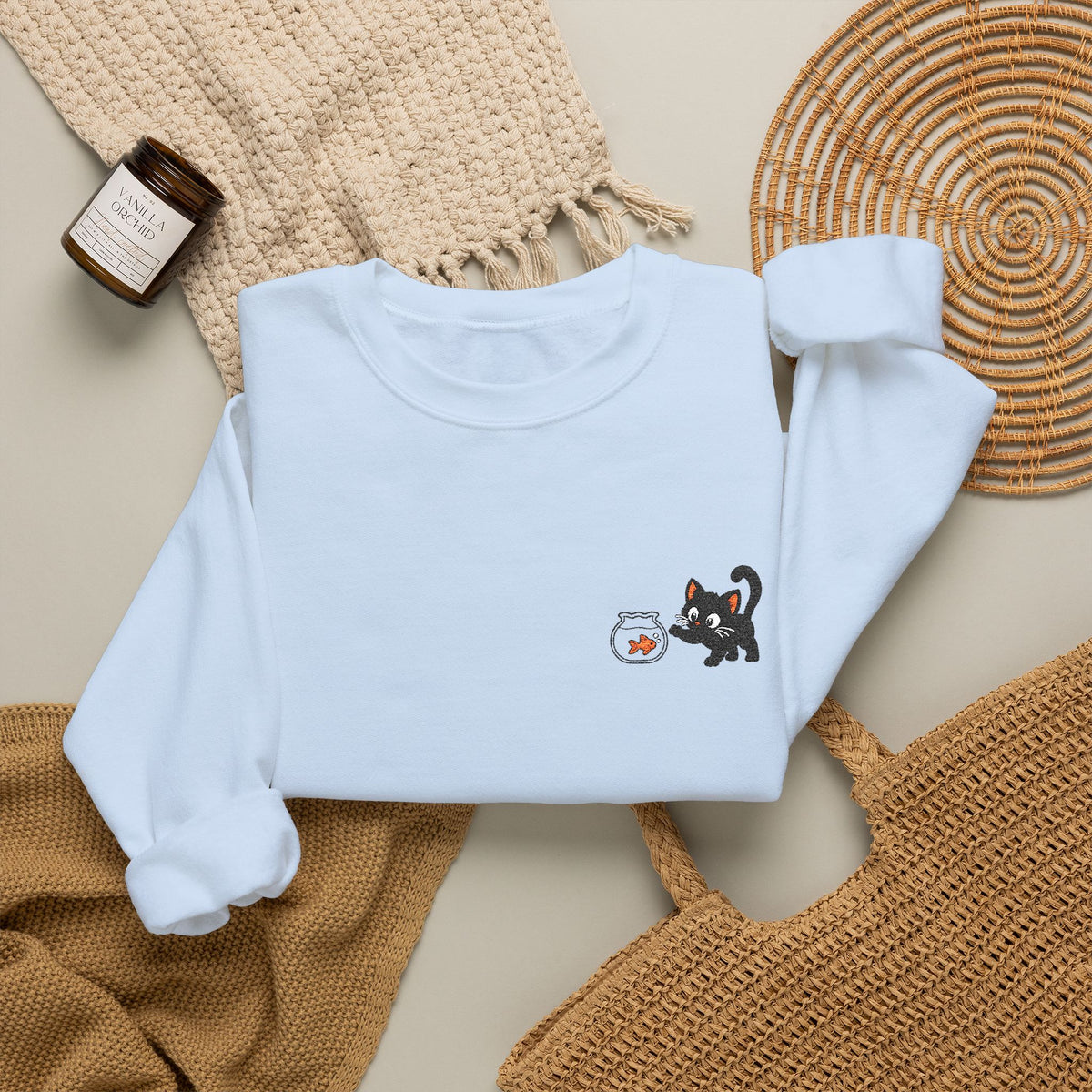 Embroidered Curious Black Kitten with Goldfish Bowl Sweatshirt | Small Left Logo Graphic